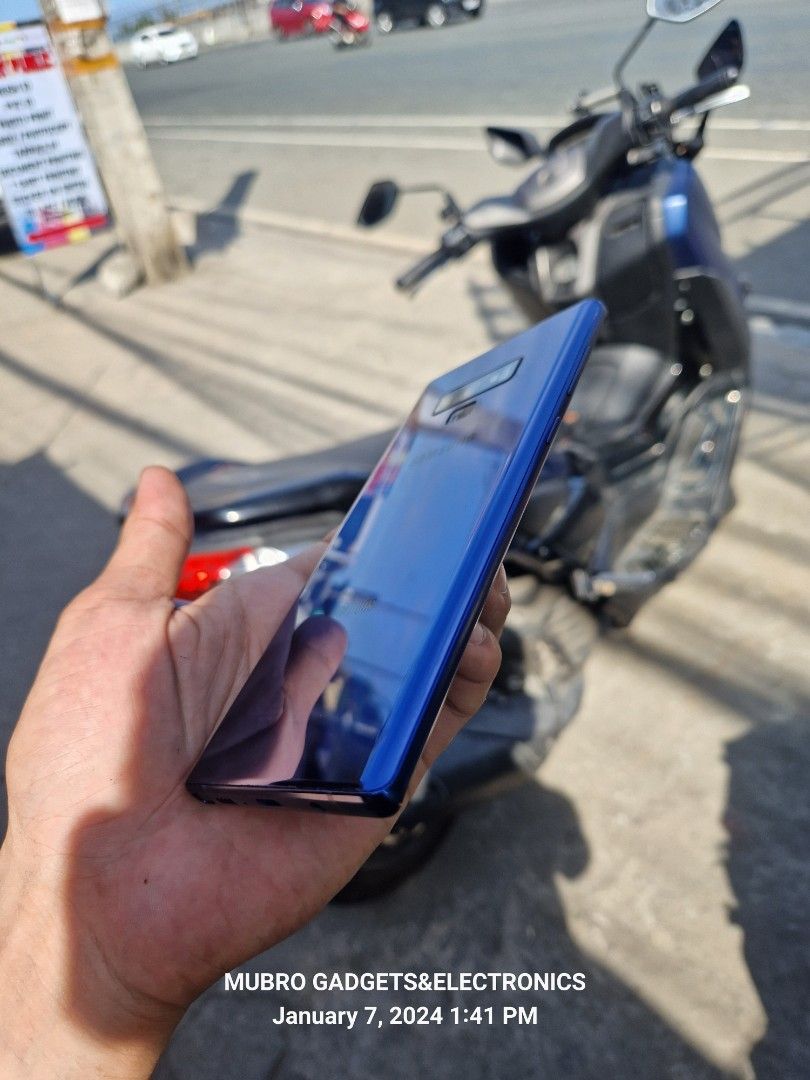 Samsung Note 9 (Category: Samsung) located in Quezon City. Submitted by mubrogadgets (Listing ID 1277726810, Image 3). Description: SAMSUNG NOTE 9 No issue No hidden issue No amoled bune 95% smooth Super smooth ng performance 128gb rom 6gb ram👍 4G LTE-A (6CA) Cat18 🙀 Chipset Exynos 9810 (10 nm) Octa-core GPU Mali-G72 MP18 OS Android 9.0 (Pie) Card slot microSD, up to 1 TB Stylus (Bluetooth integration) IP68 dust/water resistant (up to 1.5m for 