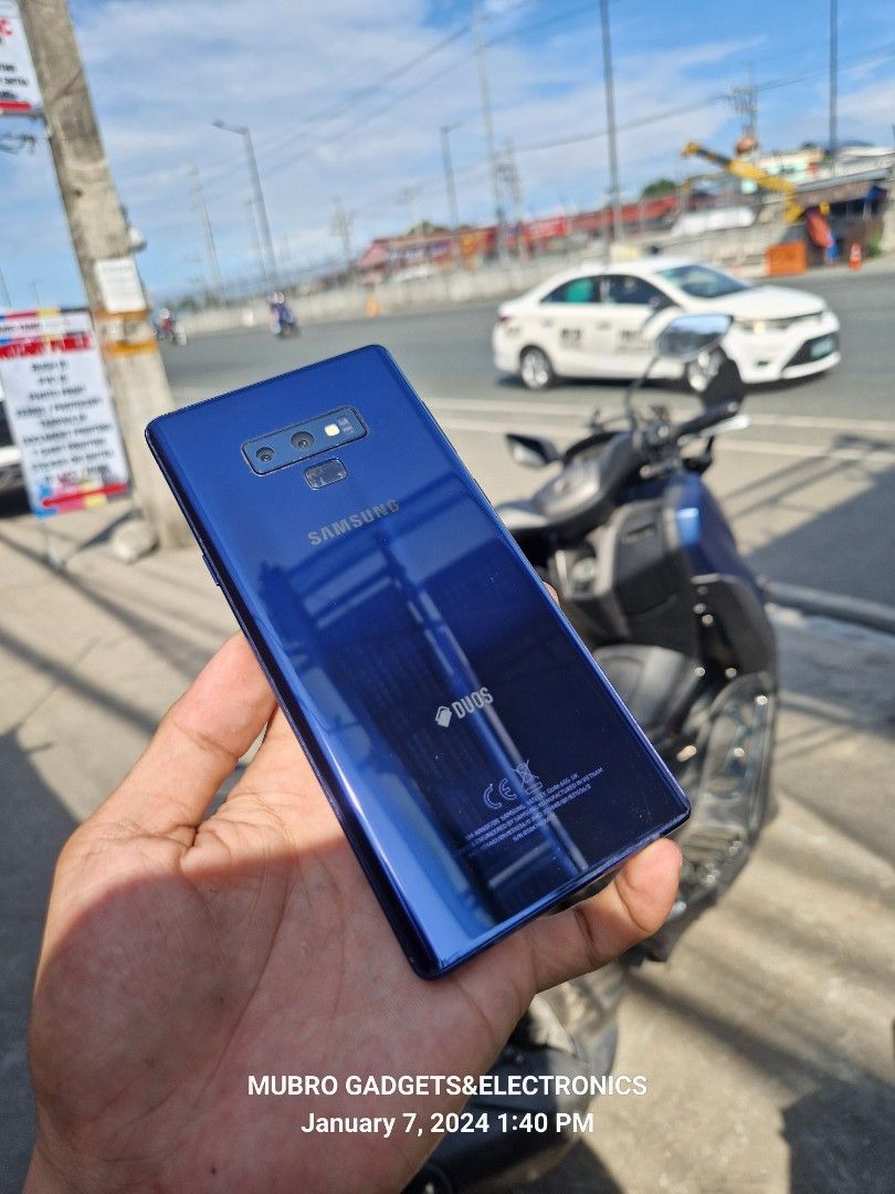 Samsung Note 9 (Category: Samsung) located in Quezon City. Submitted by mubrogadgets (Listing ID 1277726810, Image 2). Description: SAMSUNG NOTE 9 No issue No hidden issue No amoled bune 95% smooth Super smooth ng performance 128gb rom 6gb ram👍 4G LTE-A (6CA) Cat18 🙀 Chipset Exynos 9810 (10 nm) Octa-core GPU Mali-G72 MP18 OS Android 9.0 (Pie) Card slot microSD, up to 1 TB Stylus (Bluetooth integration) IP68 dust/water resistant (up to 1.5m for 