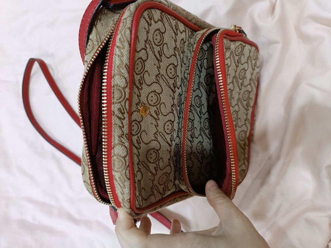 Smiley sling bag hotsell