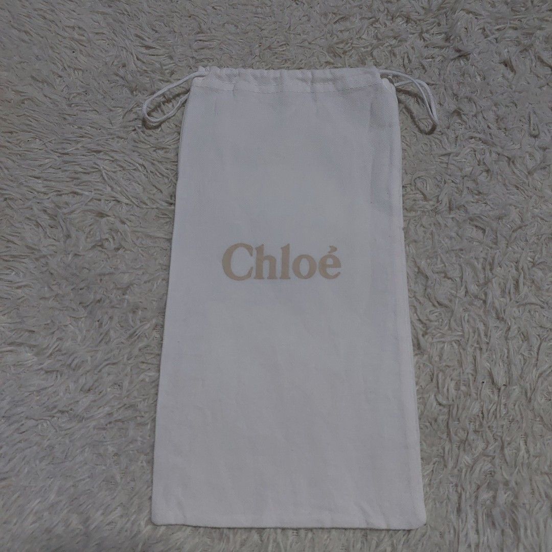 Authentic Chloe dust bag 12.5x6.5 inches (Category: Luxury Bags & Wallets) located in Manila. Submitted by jfluxury.co (Listing ID 1277980140, Image 2). Description: excellent condition no flaws bought in Japan 🇯🇵 💯% Authentic. 😊 Money back guarantee. 😊 Clean and ready to use na po.