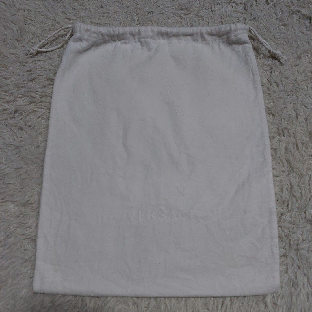 Authentic Versace dust bag 12.5x10 inches (Category: Luxury Bags & Wallets) located in Manila. Submitted by jfluxury.co (Listing ID 1277980711, Image 2). Description: excellent condition no flaws bought in Japan 🇯🇵 💯% Authentic. 😊 Money back guarantee. 😊 Clean and ready to use na po.