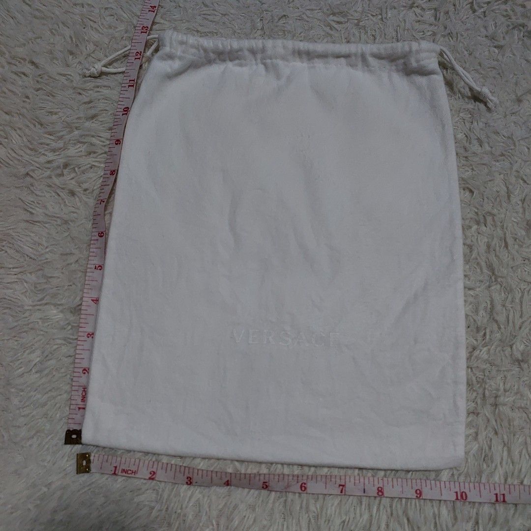 Authentic Versace dust bag 12.5x10 inches (Category: Luxury Bags & Wallets) located in Manila. Submitted by jfluxury.co (Listing ID 1277980711, Image 3). Description: excellent condition no flaws bought in Japan 🇯🇵 💯% Authentic. 😊 Money back guarantee. 😊 Clean and ready to use na po.