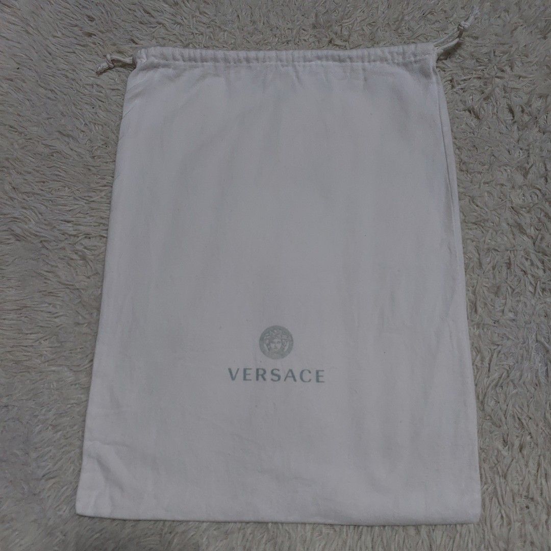 Authentic Versace dust bag 16x12 inches (Category: Luxury Bags & Wallets) located in Manila. Submitted by jfluxury.co (Listing ID 1277980532, Image 2). Description: excellent condition no flaws bought in Japan 🇯🇵 💯% Authentic. 😊 Money back guarantee. 😊 Clean and ready to use na po.
