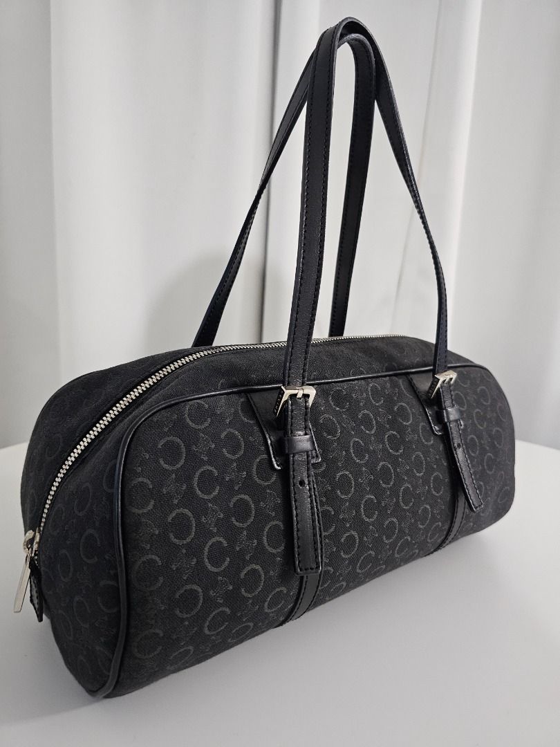 🧡Celine C Macadam Triomphe Small Boston Bag (Category: Luxury Bags & Wallets) located in Las Pinas. Submitted by mybagsfromthepast (Listing ID 1277938264, Image 2). Description: 100% Original Celine C Macadam Triomphe Mini/Small Boston Bag in Black canvas/leather in silver hardware with 1 internal open pocket Timeless and versatile piece for all occassions Very good preloved condition with minimal signs of wear such as rubs Measurements (Approx)