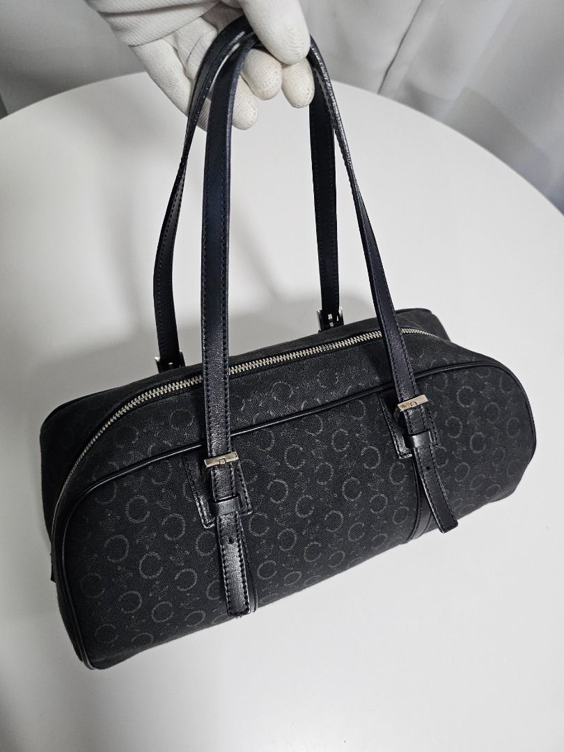 🧡Celine C Macadam Triomphe Small Boston Bag (Category: Luxury Bags & Wallets) located in Las Pinas. Submitted by mybagsfromthepast (Listing ID 1277938264, Image 3). Description: 100% Original Celine C Macadam Triomphe Mini/Small Boston Bag in Black canvas/leather in silver hardware with 1 internal open pocket Timeless and versatile piece for all occassions Very good preloved condition with minimal signs of wear such as rubs Measurements (Approx)