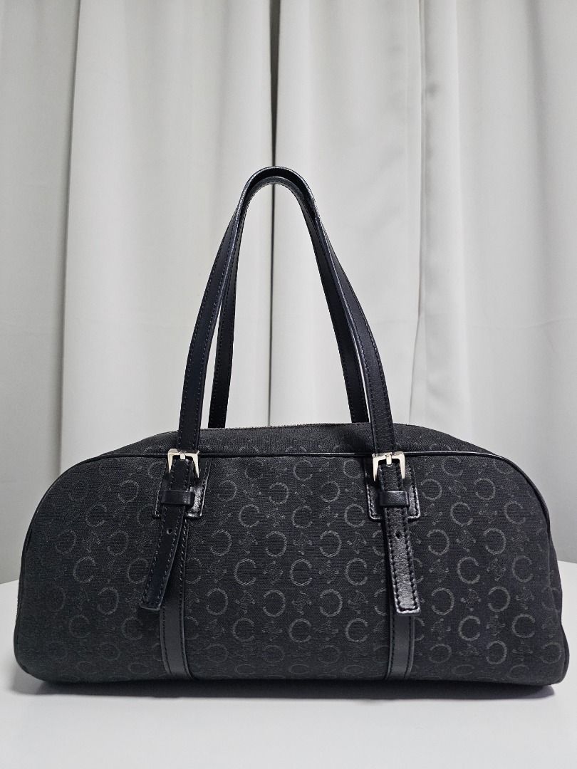 🧡Celine C Macadam Triomphe Small Boston Bag (Category: Luxury Bags & Wallets) located in Las Pinas. Submitted by mybagsfromthepast (Listing ID 1277938264, Image 1). Description: 100% Original Celine C Macadam Triomphe Mini/Small Boston Bag in Black canvas/leather in silver hardware with 1 internal open pocket Timeless and versatile piece for all occassions Very good preloved condition with minimal signs of wear such as rubs Measurements (Approx)