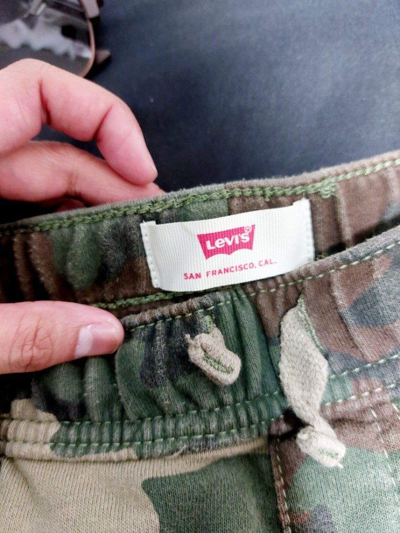 LEVIS Unisex Camouflage Shorts (Category: Shorts) located in Quezon City. Submitted by cinco.plus.apparel (Listing ID 1277958654, Image 2). Description: For Sale ‼️ Authentic Levis Camouflage unisex Short SIZE: Large on tag DIMENSIONS : Waist : 15 inches Length : 18 inches Leg Opening : 9.5 inches Thigh : 10 inches condition : In good condition (Slightly used) color rate : 9/10 Issues : NO ISSUES Price : Php 450 Mode of Payment: 👌🏻 Payment firs