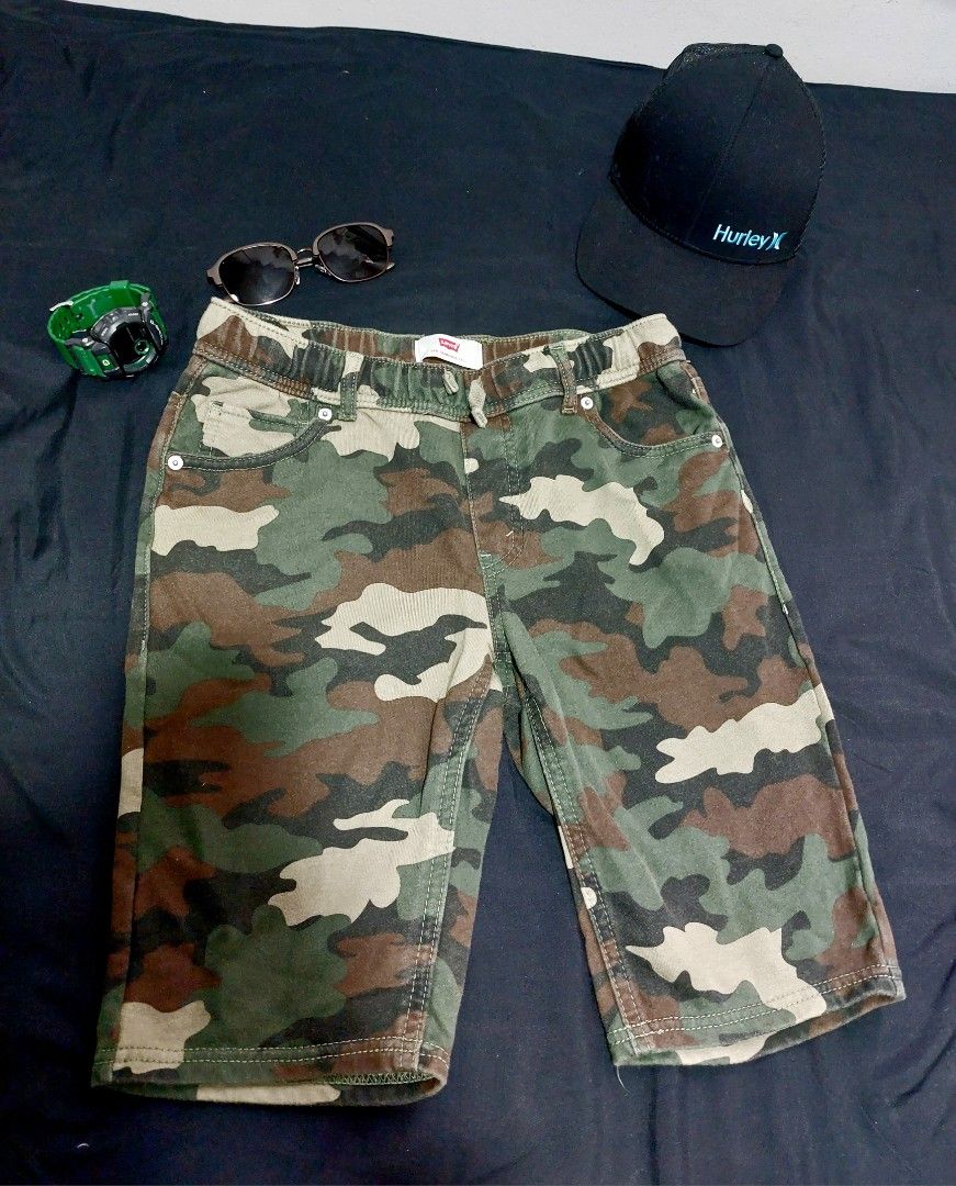 LEVIS Unisex Camouflage Shorts (Category: Shorts) located in Quezon City. Submitted by cinco.plus.apparel (Listing ID 1277958654, Image 1). Description: For Sale ‼️ Authentic Levis Camouflage unisex Short SIZE: Large on tag DIMENSIONS : Waist : 15 inches Length : 18 inches Leg Opening : 9.5 inches Thigh : 10 inches condition : In good condition (Slightly used) color rate : 9/10 Issues : NO ISSUES Price : Php 450 Mode of Payment: 👌🏻 Payment firs