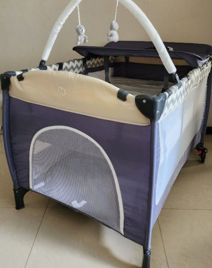 Lightly used playpen with brand new thick 4