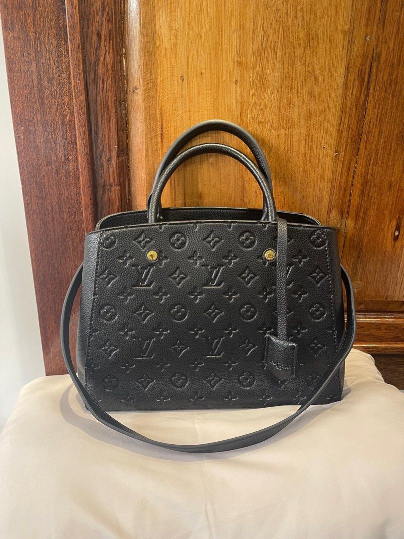 Louis Vuitton Monogram Empreinte (Category: Luxury Bags & Wallets) located in Don Carlos. Submitted by thejoyofbags2 (Listing ID 1277932624, Image 1). Description: -Preloved -Louis Vuitton Monogram Empreinte Montaigne MM M41048 Noir -Can be worn as handbag and shoulder bag Coded Real leather Pm for more information.