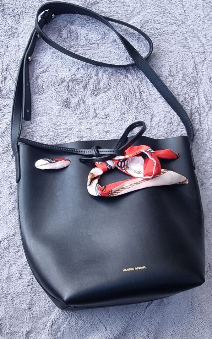 Original Mansur Gavriel Mini Bucket Bag (Category: Luxury Bags & Wallets) located in Talisay. Submitted by parchiracollection (Listing ID 1277949080, Image 1). Description: *small, unnoticeable rub in one corner other than that, no other flaws *super light weight! *plus SF * This is a second-hand item, kaya wag po mag expect na BAGO *no to low ballers. The discounted price I'll give is the final price. *NO COD, NO COP, NO $h0p€€ CHECK OUT *MOP: G