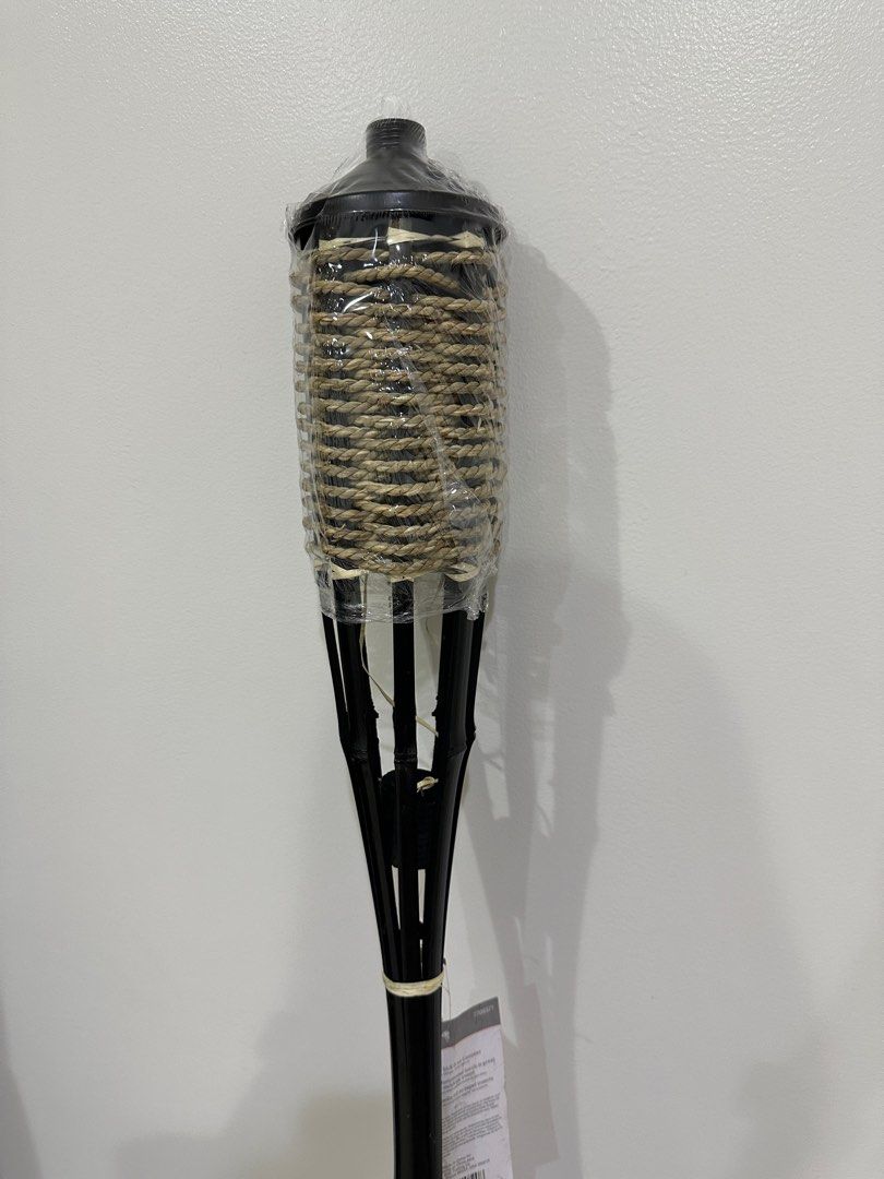 NEW Bamboo Tiki Torch with Cap (Category: Other Home Decor) located in San Juan City. Submitted by quickdolphin.0fab36 (Listing ID 1278014160, Image 2). Description: - only 1 stock available - 59" torch - 16.9 fl oz canister.