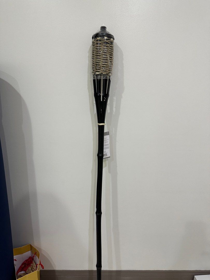 NEW Bamboo Tiki Torch with Cap (Category: Other Home Decor) located in San Juan City. Submitted by quickdolphin.0fab36 (Listing ID 1278014160, Image 1). Description: - only 1 stock available - 59" torch - 16.9 fl oz canister.