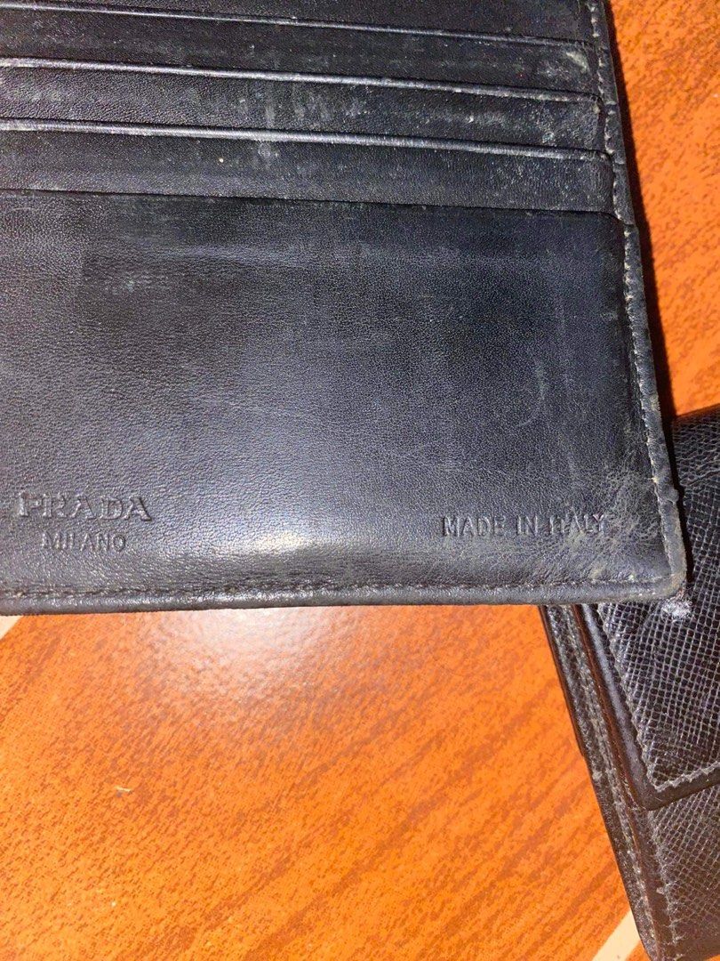 Prada bandle (Category: Luxury Bags & Wallets) located in Davao. Submitted by japanamerican (Listing ID 1278018872, Image 2). Description: Prada bifold Prada coinpurse meron flaws sa loob u can see the last pic All japan surplus.