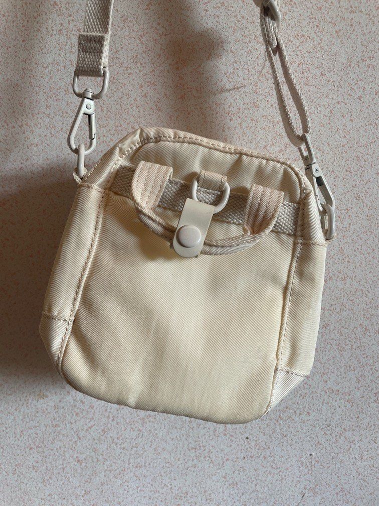 DOUGHNUT Tiny Macaroon Cream Color (Category: Cross-body Bags) located in Batangas. Submitted by declutter.btg.mnl (Listing ID 1328422501, Image 3). Description: Has slight discoloration, check photo RFS: need funds, also not using much, I prefer larger bags Bought this in Megamall :) I do prefer meet ups. USUALLY Megamall on weekends/Batangas area weekdays.