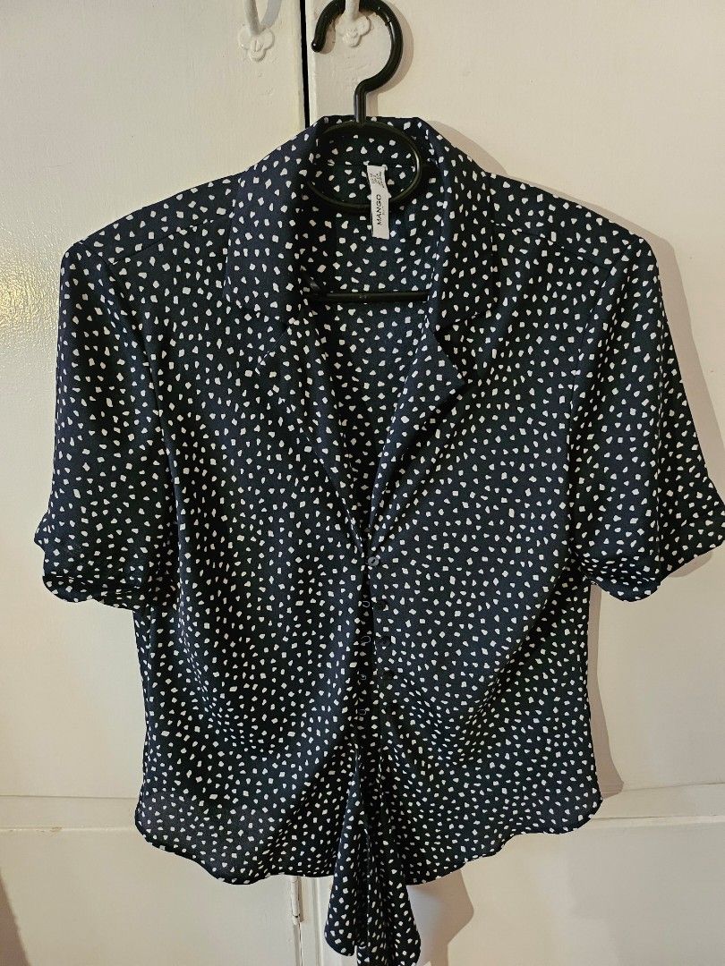 Mango button down top (Category: Blouses) located in Pasig City. Submitted by yoursforless2 (Listing ID 1328532279, Image 1). Description: had to sell right away this mango top I got from another carouseller. super small on me, thought this would be like the usual loose fit of mango tops. best fits true XXS- XS/US2 sizes, not for medium frames like me 😅.