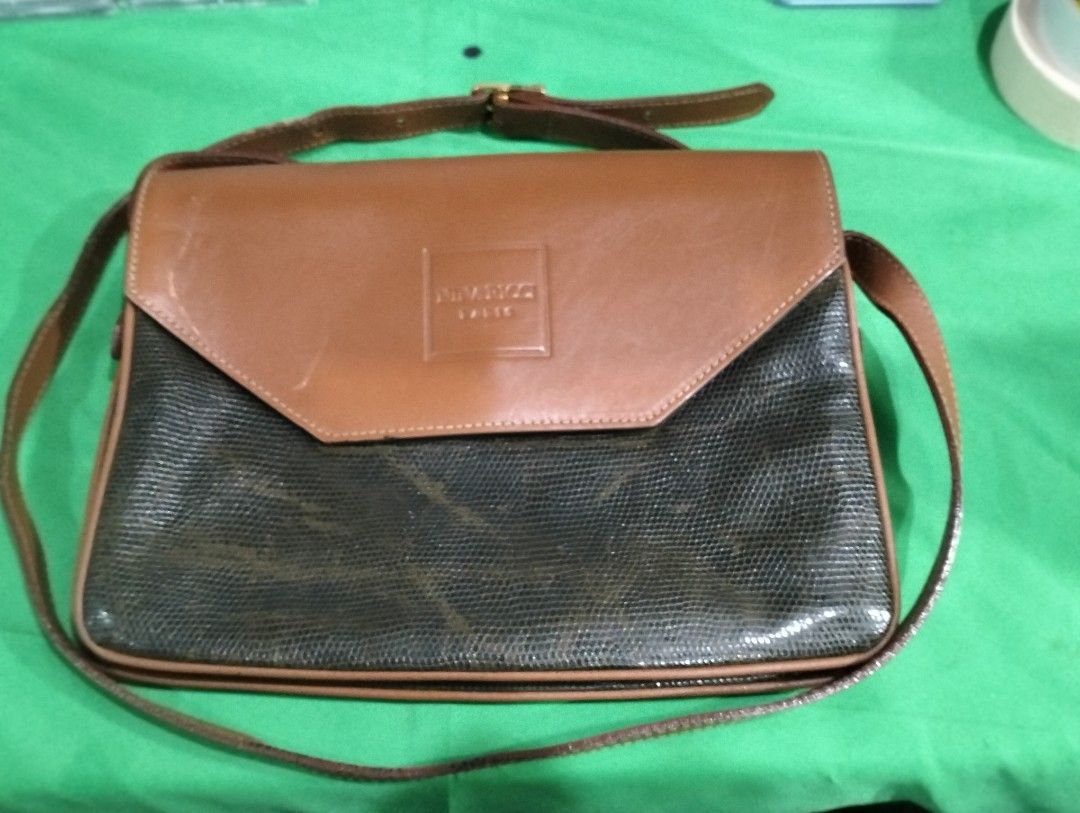 Nina Ricci Paris Shoulder bag (Category: Luxury Bags & Wallets) located in Davao. Submitted by soleace (Listing ID 1328555839, Image 1). Description: Leather all over Snake skin design MOP: Gcash/Maya.