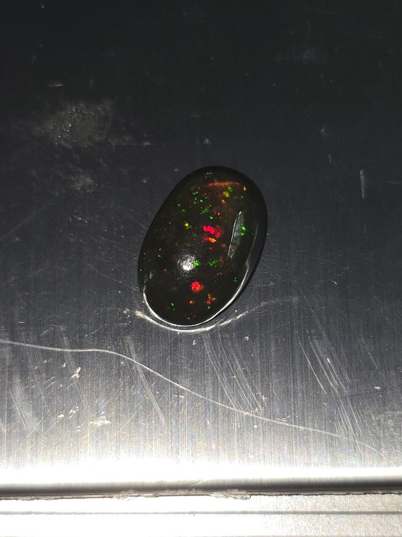 Opal (Category: Rings) located in Singapore. Submitted by mascurios (Listing ID 1328499754, Image 3). Description: Natural Black Opal size: 14.3 x 9.7 x 5.6mm Weight: 4.2 ct Origin: Ethiopia B01.