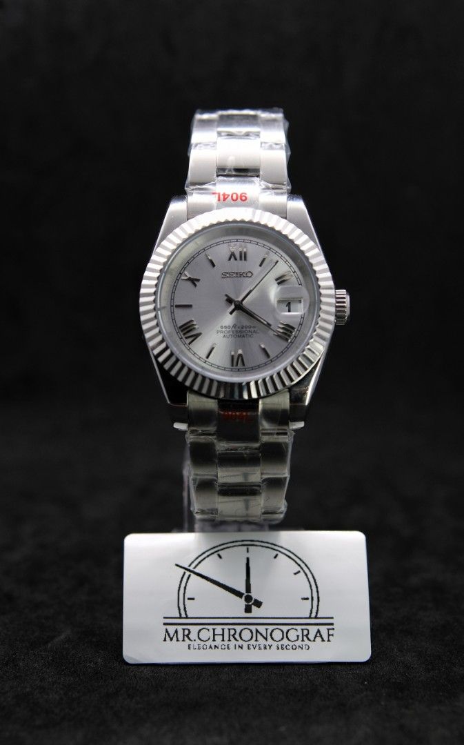 Seiko Mod Datejust Roman Silver (Category: Luxury Watches) located in Manila. Submitted by rafael_lesaguis (Listing ID 1328510270, Image 1). Description: BRANDNEW! Seiko Mod Datejust Roman Silver Movement: Seiko NH35 Automatic TMI version with winding and hacking feature Case and Strap: 39mm 904L Stainless Steel / Oyster Strap Dial: Seiko logo with roman markers on silver dial Glass: Sapphire scratch resistant Hands: Datejust hands Timegrapher ca