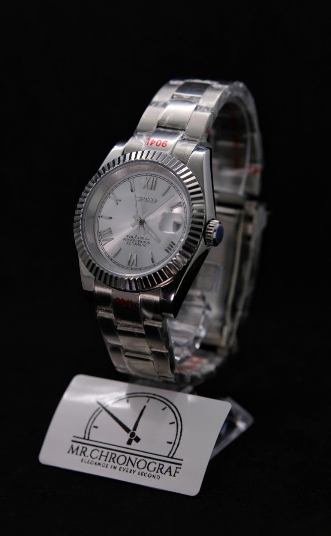 Seiko Mod Datejust Roman Silver (Category: Luxury Watches) located in Manila. Submitted by rafael_lesaguis (Listing ID 1328510270, Image 3). Description: BRANDNEW! Seiko Mod Datejust Roman Silver Movement: Seiko NH35 Automatic TMI version with winding and hacking feature Case and Strap: 39mm 904L Stainless Steel / Oyster Strap Dial: Seiko logo with roman markers on silver dial Glass: Sapphire scratch resistant Hands: Datejust hands Timegrapher ca