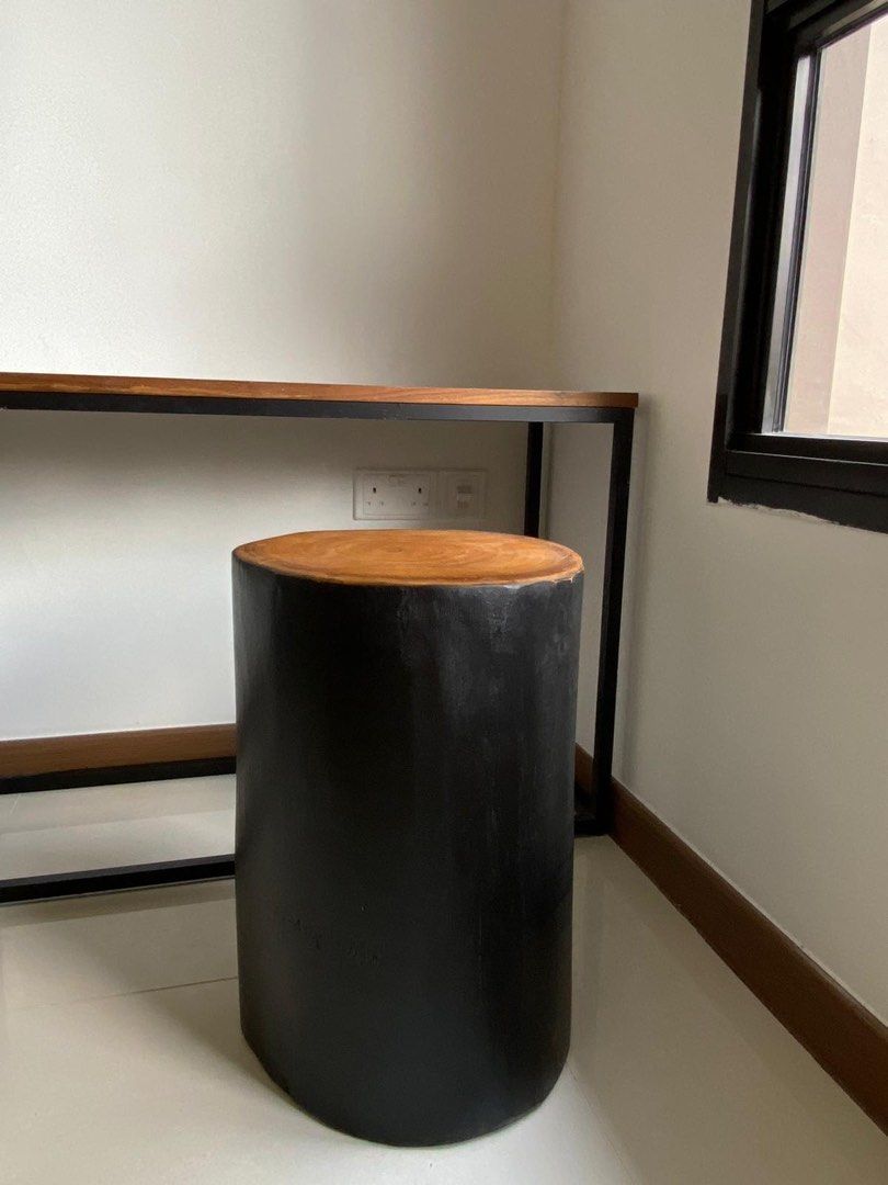 Tong Stool - Solid wooden stool, side table (Category: Other Home Furniture) located in Singapore. Submitted by 123lol (Listing ID 1328570708, Image 1). Description: Solid Wooden Stool, side table around Dia.32x H47cm Can use as a Stool or side table. Finish: black body and nature lacquer top First come first serve, one piece only. Each piece is unique and with its own character. https://www.mcmhouse.com/collections/stools/products/tonk-stool.