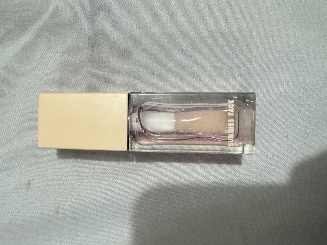 Sunnies Face Lip Elixir in Plasma (Category: Makeup) located in Mandaluyong City. Submitted by ccshoppes (Listing ID 1328561986, Image 2). Description: Barely used .