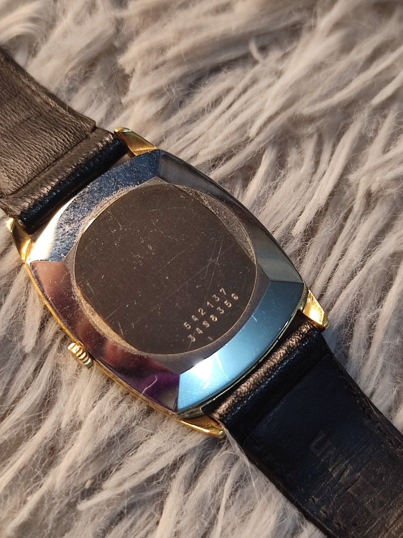 Universal Geneve Pinstripe Manual Wind Watch (Category: Luxury Watches) located in Basud. Submitted by ClaireLavin (Listing ID 1328545622, Image 3). Description: Sale until this December only! Guaranteed Authentic ✅ gold plated with leather strap working condition vintage watch, manual winding.