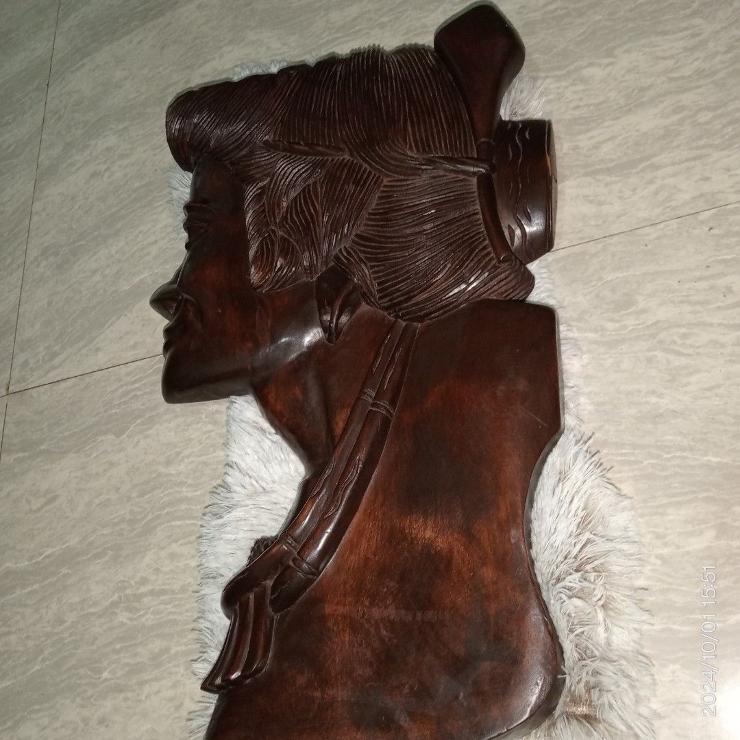 Vintage hand carved solid wood wall art large size (Category: Wall Decor) located in Batangas. Submitted by girlmeetspurple (Listing ID 1328496403, Image 3). Description: This charming solid wood girl carving Cameo design from Japan is a beautiful example of traditional Japanese craftsmanship. Crafted from high-quality solid wood, the carving showcases intricate details and delicate features. Collecting Value: Solid wood girl carving from Japan a