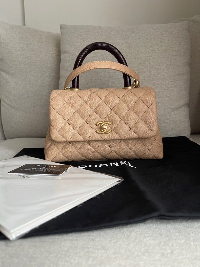 Authentic Chanel Coco Handle Small (Category: Bags & Wallets) located in Singapore. Submitted by tbblove (Listing ID 1330009221, Image 1). Description: Condition like new!no scuffing no stain. Comes with auth card n dustbag only. Series start 29 Slight nego for fast deal but no lowball pls..