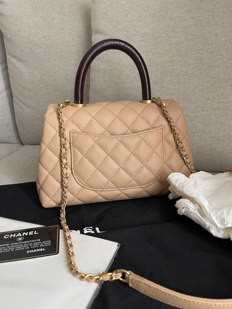 Authentic Chanel Coco Handle Small (Category: Bags & Wallets) located in Singapore. Submitted by tbblove (Listing ID 1330009221, Image 2). Description: Condition like new!no scuffing no stain. Comes with auth card n dustbag only. Series start 29 Slight nego for fast deal but no lowball pls..