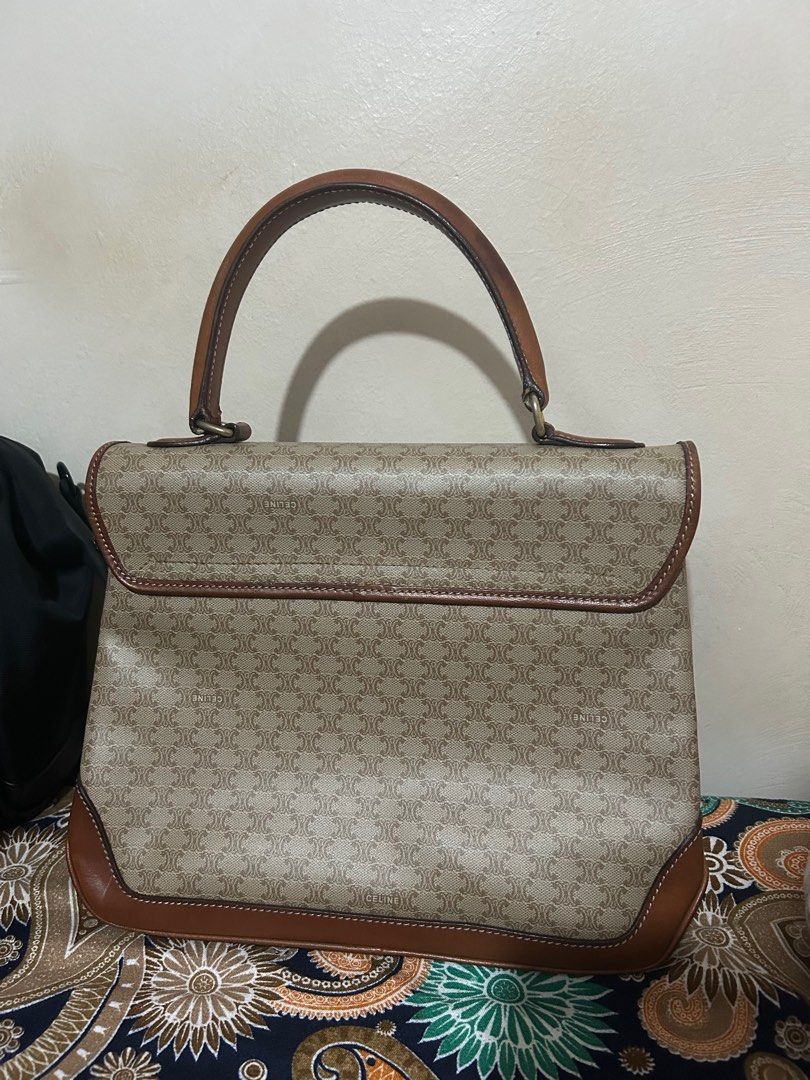 Authentic preloved Celine Vintage Hand Bag (Category: Luxury Bags & Wallets) located in Muntinlupa City. Submitted by prei_g (Listing ID 1330132285, Image 2). Description: Selling preloved authentic Celine Vintage Hand bag 👜 Please manage your expectations since this is a preloved bag. With signs of usage as you can see from the photos..