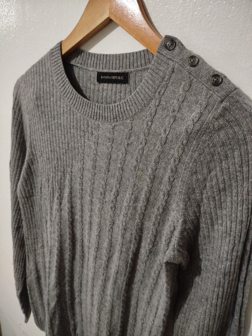 Banana Republic Knitted Sweater (Category: Longsleeves) located in Manila. Submitted by declutterfairy_ph (Listing ID 1330098038, Image 2). Description: Size: cut tag/s, can fit up to Large, stretchy Shoulder width: 12.5 inches (flat lay) Armpit width: 18 inches Length: 24 inches -Well used but in a good condition. -No major flaws, just the usual sign of usage. -Tiny rust-like stain (see last pic), might be washable. -When worn photo posted..