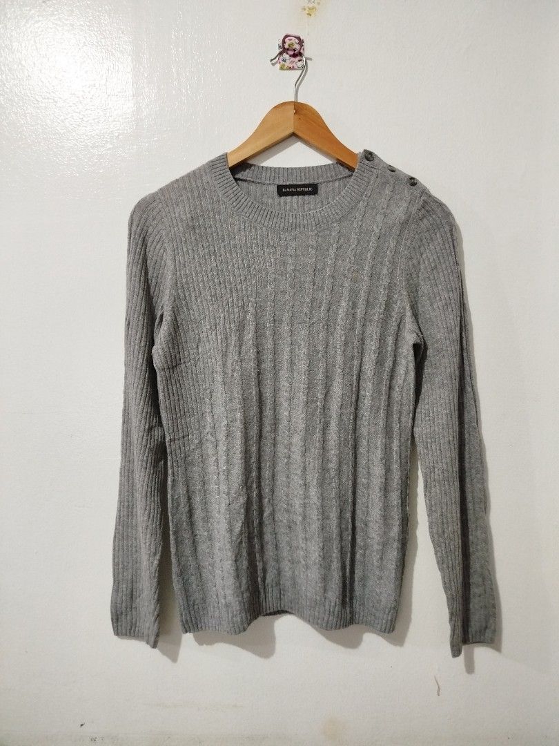 Banana Republic Knitted Sweater (Category: Longsleeves) located in Manila. Submitted by declutterfairy_ph (Listing ID 1330098038, Image 1). Description: Size: cut tag/s, can fit up to Large, stretchy Shoulder width: 12.5 inches (flat lay) Armpit width: 18 inches Length: 24 inches -Well used but in a good condition. -No major flaws, just the usual sign of usage. -Tiny rust-like stain (see last pic), might be washable. -When worn photo posted..