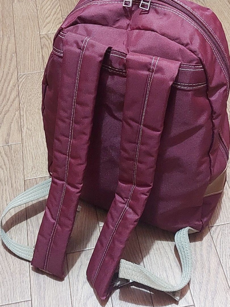 SALE! Chevignon Backpack (Category: Luxury Bags & Wallets) located in Muntinlupa City. Submitted by sakurambo_des (Listing ID 1330130349, Image 2). Description: Original Chevignon Backpack Maroon red Nylon materials pwedeng unisex in very good condition..