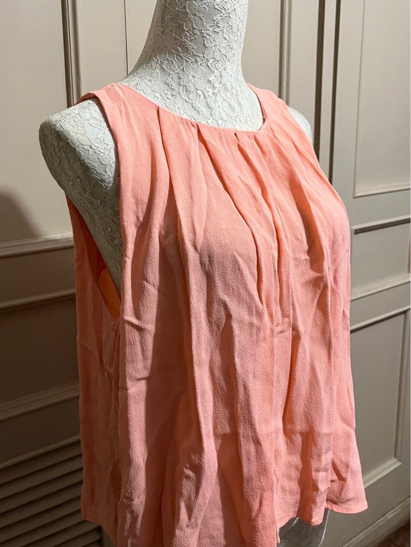 Forever 21 Pink Salmon Sleeveless Top (Category: Sleeveless) located in Manila. Submitted by emmarim (Listing ID 1330146619, Image 2). Description: Forever 21 Sleeveless Top Can fit S-M.