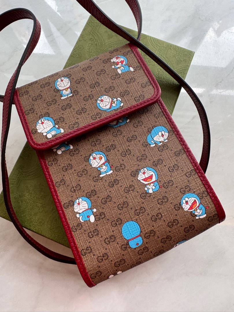 Gucci doraemon sling pouch crossbody bag, Women's Fashion, Bags