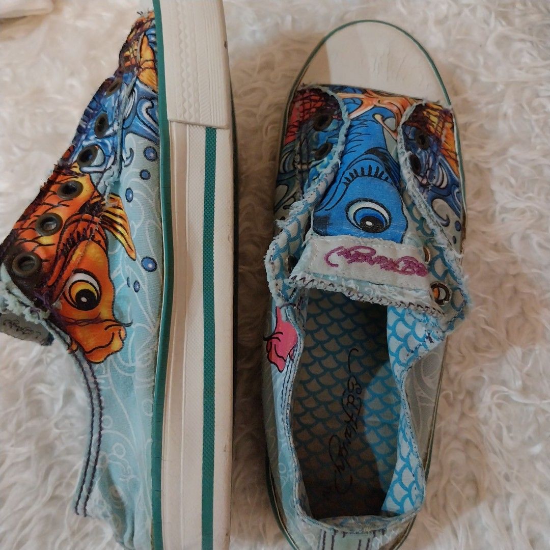 Original ED HARDY sneakers (Category: Sneakers & Footwear) located in Quezon City. Submitted by mgrc08 (Listing ID 1330109048, Image 2). Description: vintage look sneakers very comfy well used but maintained except for the cracked rubber upfront but it can go with the look.