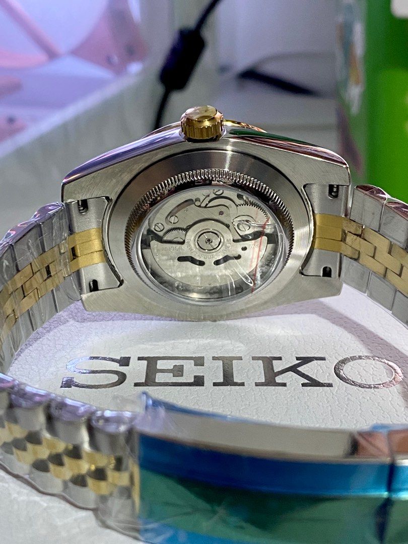 Seiko Mod Date Just Two Tone (Category: Luxury Watches) located in Manila. Submitted by jey09 (Listing ID 1330008962, Image 3). Description: Seiko Mod Date Just Two Tone Roman Dial •Automatic •Nh35/Nh36 Movement •Jubilee bracelet •Sapphire Glass •With box and paper bag Price: ₱6000 Mop: Gcash, Maya or Bank Transfer Courier: Lbc, Lalamove or j&t.