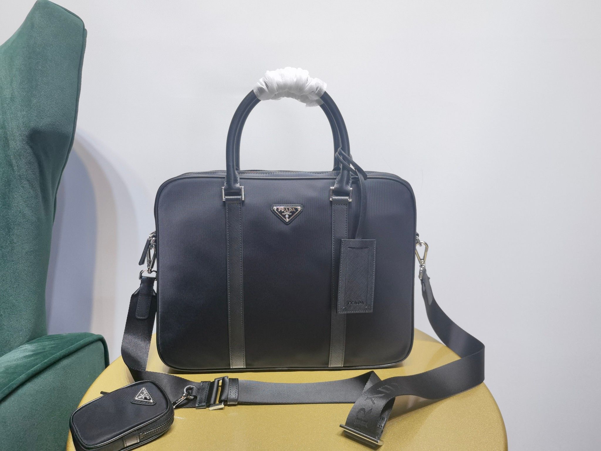 Authentic prada nylon briefcase tote bag (Category: Bags & Wallets) located in Singapore. Submitted by luxurycloset.shop (Listing ID 1330308910, Image 2). Description: Brand new and authentic Mail included Deal via courier delivery Size: width 36x height 28x bottom 8cm.