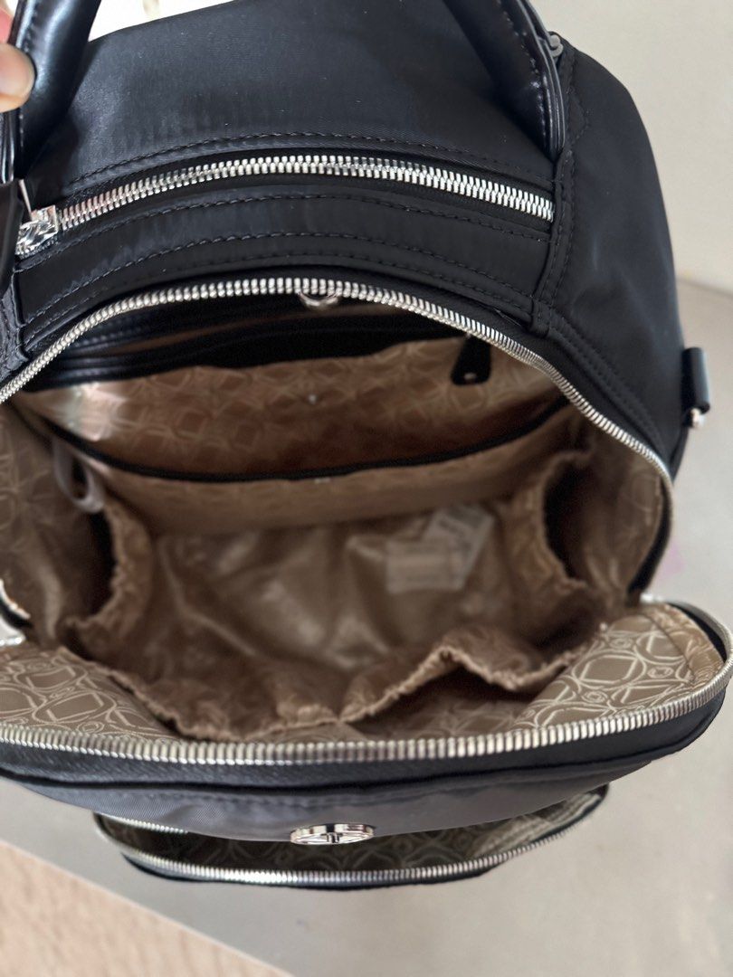 Backpack (Category: Backpacks) located in Singapore. Submitted by nxt9319 (Listing ID 1330175141, Image 4). Description: Brand new Kerikit backpack that can double up as a diaper bag. Bought from the UK for SGD 220. Still within warranty. Size & Weight: L 33 x W 20 cm x H 42 cm 1.5 Kg Fits a 14inch laptop Material - Nylon with faux leather back straps .