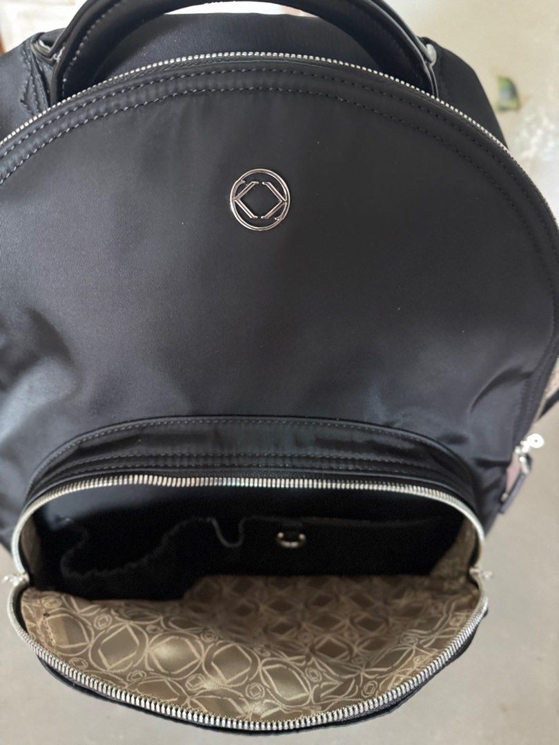 Backpack (Category: Backpacks) located in Singapore. Submitted by nxt9319 (Listing ID 1330175141, Image 6). Description: Brand new Kerikit backpack that can double up as a diaper bag. Bought from the UK for SGD 220. Still within warranty. Size & Weight: L 33 x W 20 cm x H 42 cm 1.5 Kg Fits a 14inch laptop Material - Nylon with faux leather back straps .