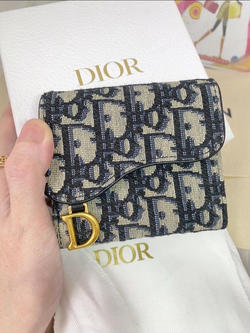 CD DIOR SADDLE OBLIQUE TRIFOLD COMPACT WALLET (Category: Luxury Bags & Wallets) located in Quezon City. Submitted by jhaediah (Listing ID 1330239675, Image 1). Description: fresh mint condition ✅RARE ‼️CD DIOR SADDLE OBLIQUE TRIFOLD COMPACT WALLET (mint condition) 🪬RANK SA/A , complete inclusion, dark blue color 🧿Inclusion: BOX, dustbag, paper bag .