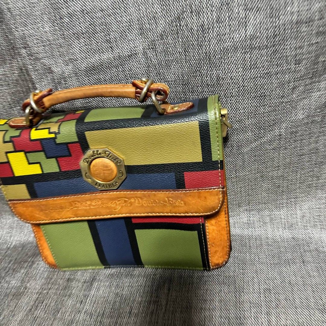 Double fish sling bag (Category: Cross-body Bags) located in Manila. Submitted by greyinfash06839 (Listing ID 1330324418, Image 2). Description: 🤍Price: 3,500 pesos only 🤍Item: Double fish sling bag 🤍Brand: Double fish 🤍Matirial: Leather 🤍Quality: Original 🤍color: Brown 🤍Size: Small 🤍Dimension. H: 7 L: 9 W: 4 🤍Sex: Unisex 🤍Issue: strap hook issue 🤍Condition Rate: 7/10 🤍Other info:.