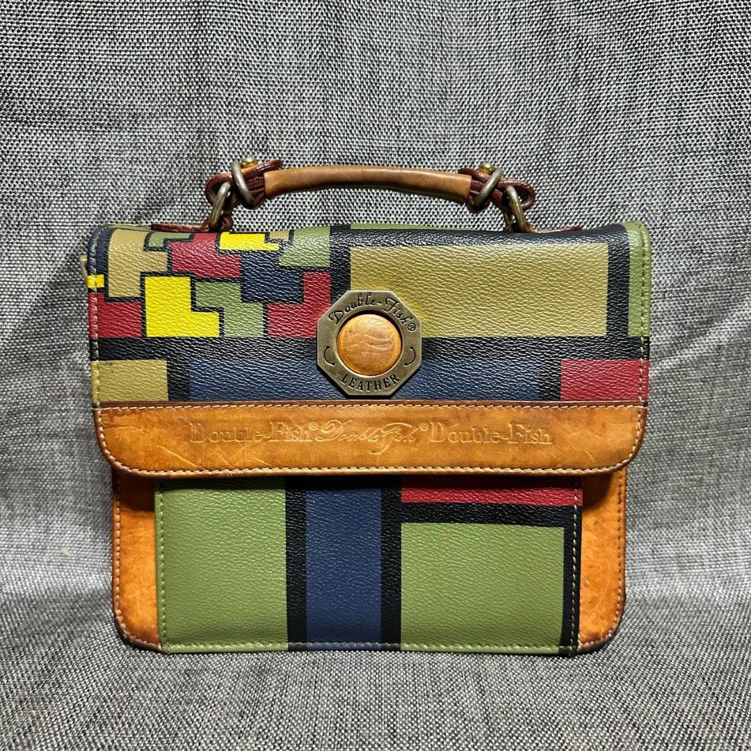 Double fish sling bag (Category: Cross-body Bags) located in Manila. Submitted by greyinfash06839 (Listing ID 1330324418, Image 1). Description: 🤍Price: 3,500 pesos only 🤍Item: Double fish sling bag 🤍Brand: Double fish 🤍Matirial: Leather 🤍Quality: Original 🤍color: Brown 🤍Size: Small 🤍Dimension. H: 7 L: 9 W: 4 🤍Sex: Unisex 🤍Issue: strap hook issue 🤍Condition Rate: 7/10 🤍Other info:.