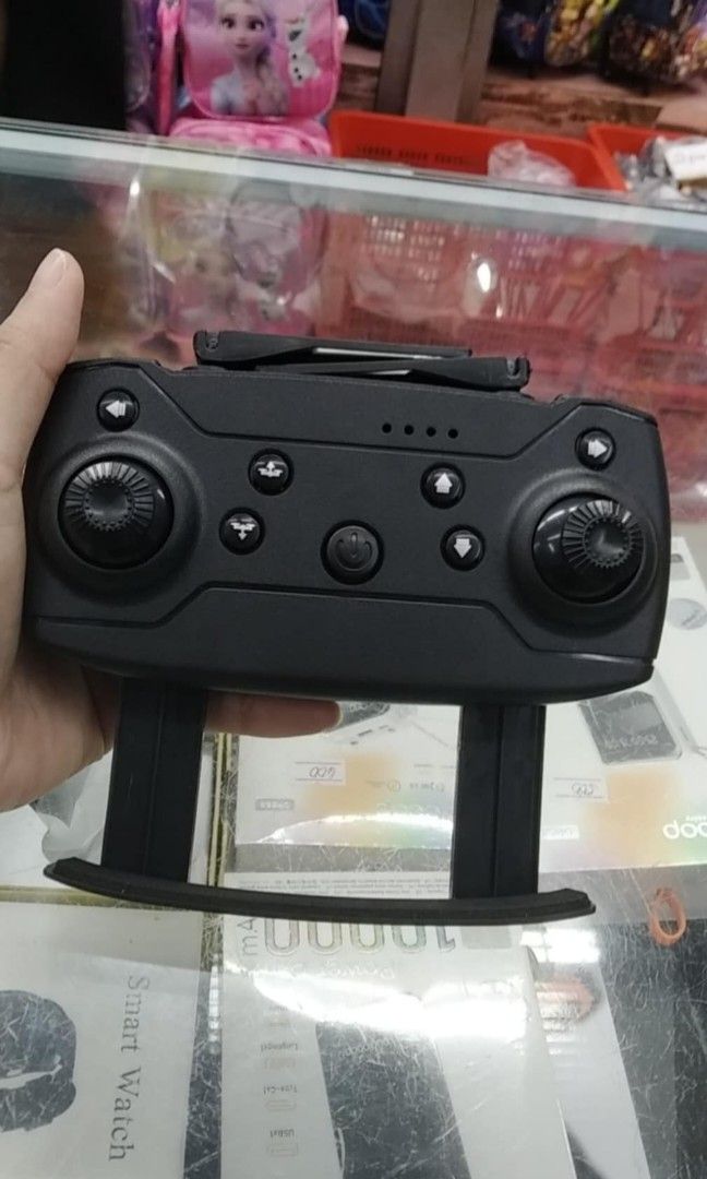 Drone with dual camera Portable mini aircraft Record Video (Category: Drones) located in Manila. Submitted by bongsy999mall (Listing ID 1330209947, Image 3). Description: For sale !!! Pocket drone!! E88 PRO SPECS: E525 DRONE 🔥1080ho camera 🔥Can be used using WIFI 🔥Can take photos and vid 🔥(CM): 10.5 *4.6*9cm 🔥 Storage bag size (CM): 22*18*6cm 🔥Product color: black 🔥 packing: storage bag 🔥Remote control 🔥 Battery paramrters: 600mAh 🔥Flig