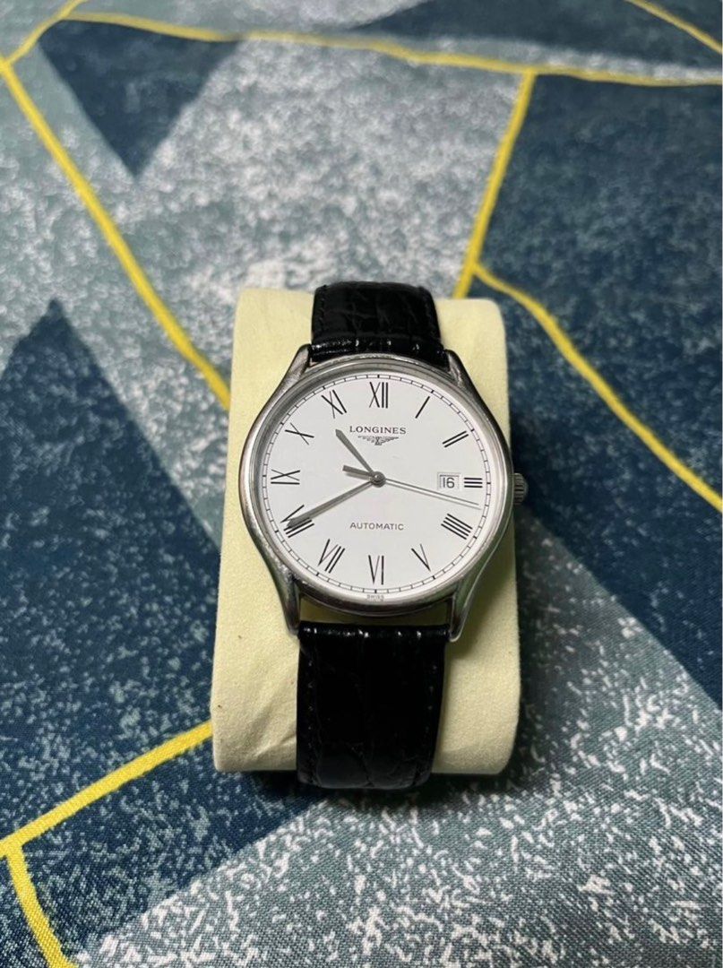 Longine Lyre Automatic (Category: Luxury Watches) located in Muntinlupa City. Submitted by aldrich1 (Listing ID 1330207249, Image 1). Description: Selling Longines Lyre Automatic 38.5mm Original black leather strap Sapphire crystal White dial, Roman hands Caliber L888.3 Watch only..