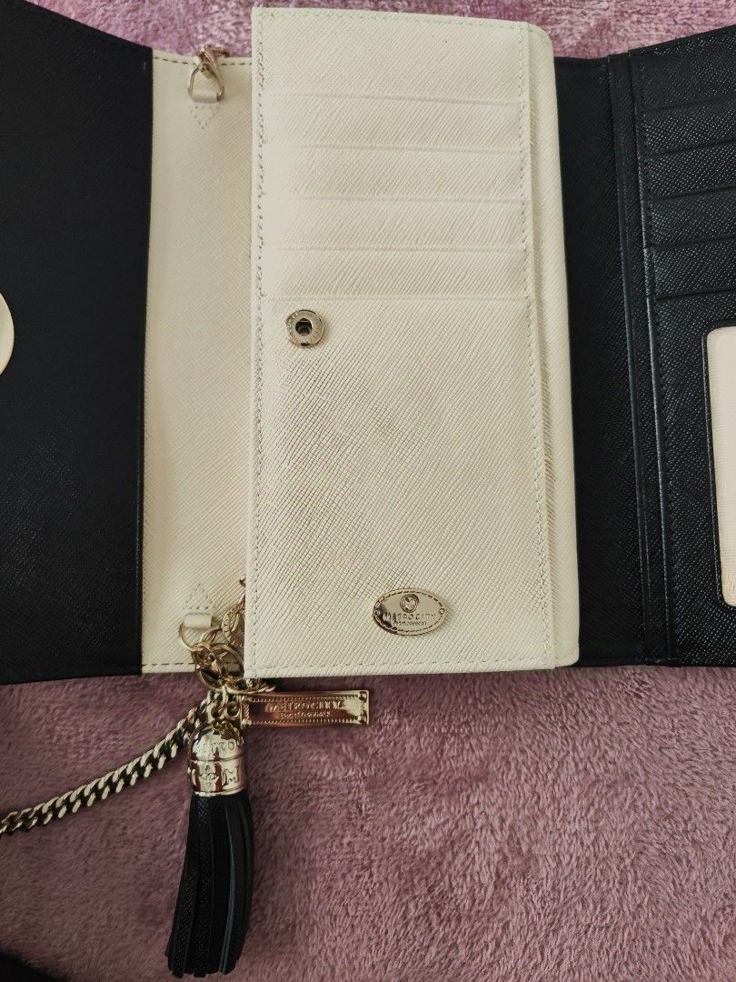 Metrocity wallet (Category: Luxury Bags & Wallets) located in Quezon City. Submitted by Dmomlife (Listing ID 1330200341, Image 2). Description: Brandnew Metrocity wallet.
