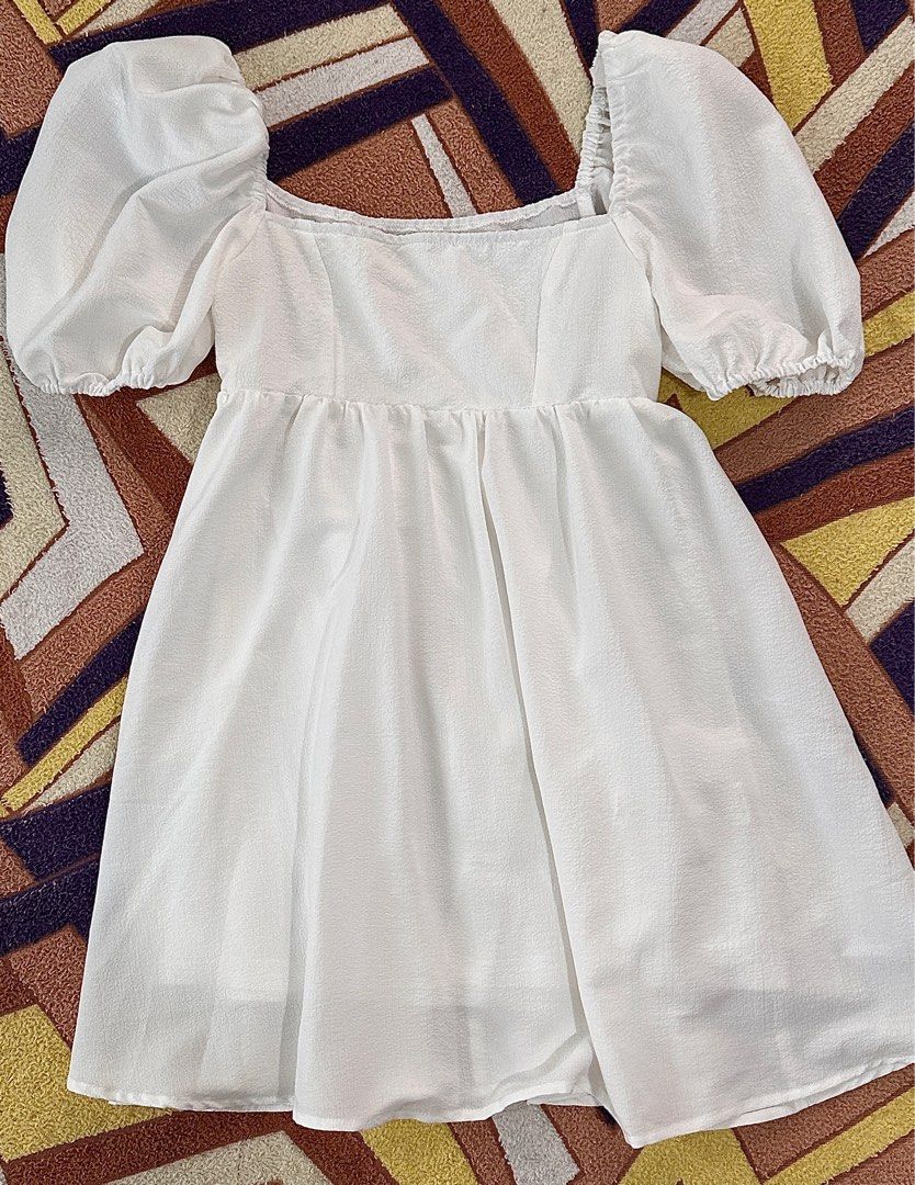 Shein Puffed Sleeve Dress (Category: Dresses) located in Manila. Submitted by jpclassics (Listing ID 1330224402, Image 3). Description: Shein White Puffed Sleeves Mini Dress Size: Small Fits up to medium sized frame Color: white Used once only In great condition No flaws Very Cute RSF: Gained weight. Does not fit me anymore :(.