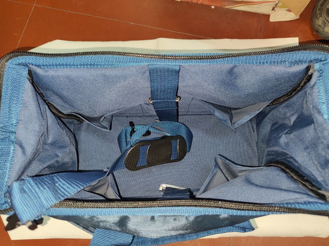 Tool Bag (Category: Construction Tools & Equipment) located in Manila. Submitted by kingkai999 (Listing ID 1330303602, Image 3). Description: A tool bag is a durable, often portable container used for storing and organizing various tools and equipment. It typically features multiple compartments, pockets, and dividers to keep tools neatly organized and easily accessible for different tasks. Tool bags come in various sizes, materials, and designs 