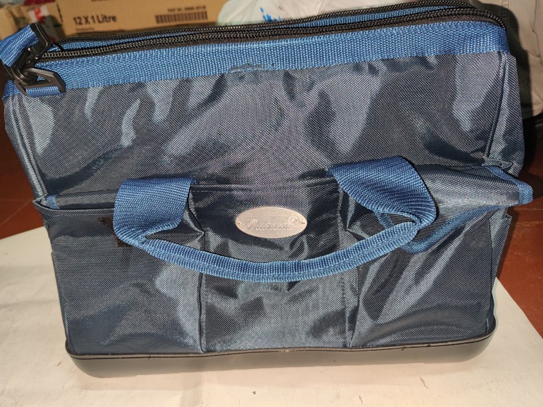 Tool Bag (Category: Construction Tools & Equipment) located in Manila. Submitted by kingkai999 (Listing ID 1330303602, Image 1). Description: A tool bag is a durable, often portable container used for storing and organizing various tools and equipment. It typically features multiple compartments, pockets, and dividers to keep tools neatly organized and easily accessible for different tasks. Tool bags come in various sizes, materials, and designs 